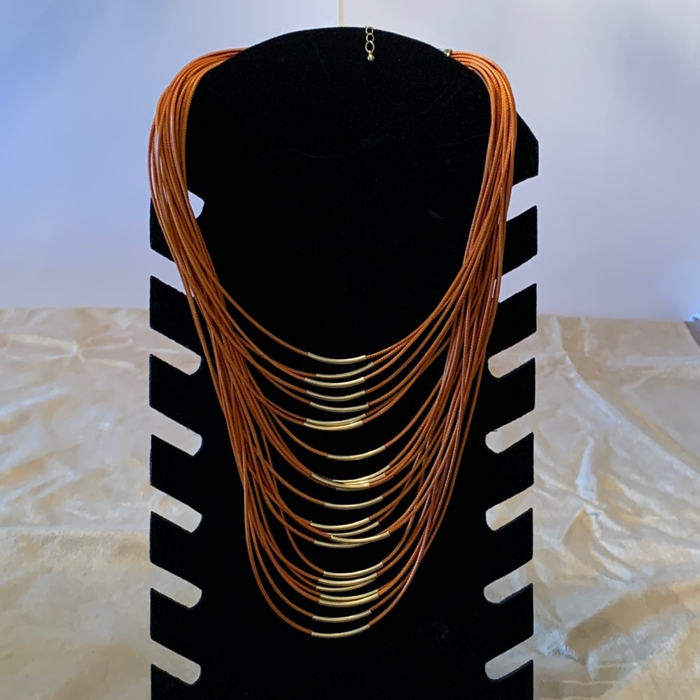 Necklace burnt orange and gold.